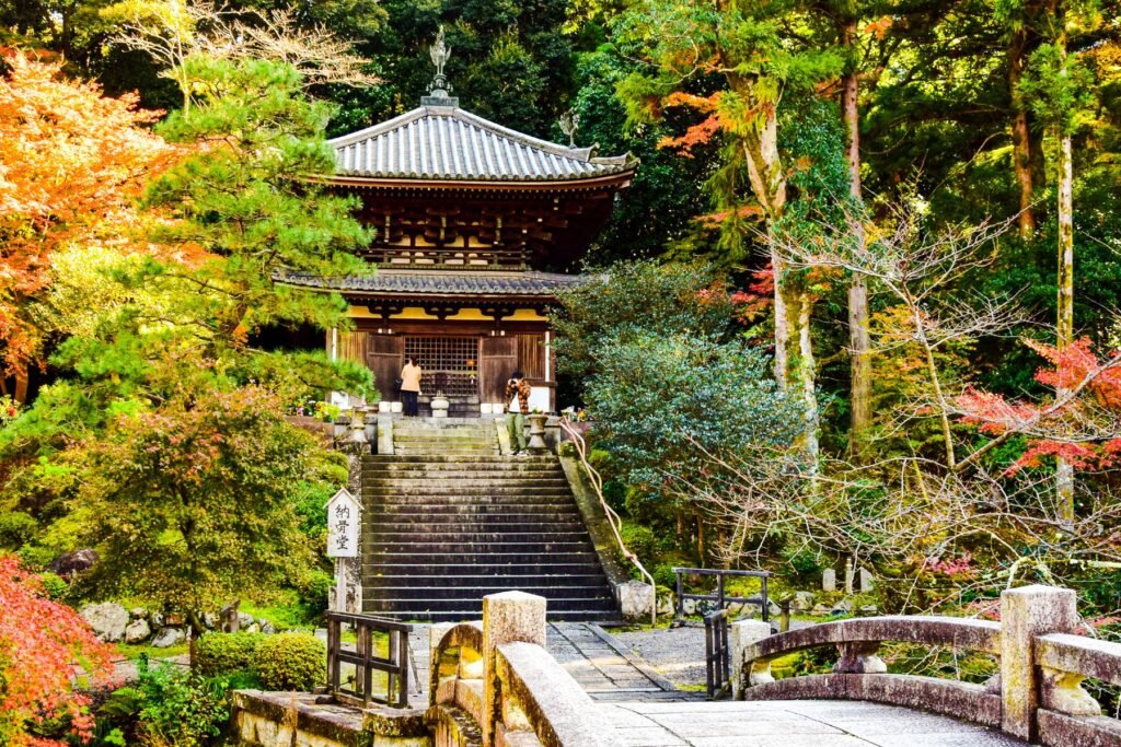 A footbridge amid autumn foliage at Chion-in Temple in Kyoto
