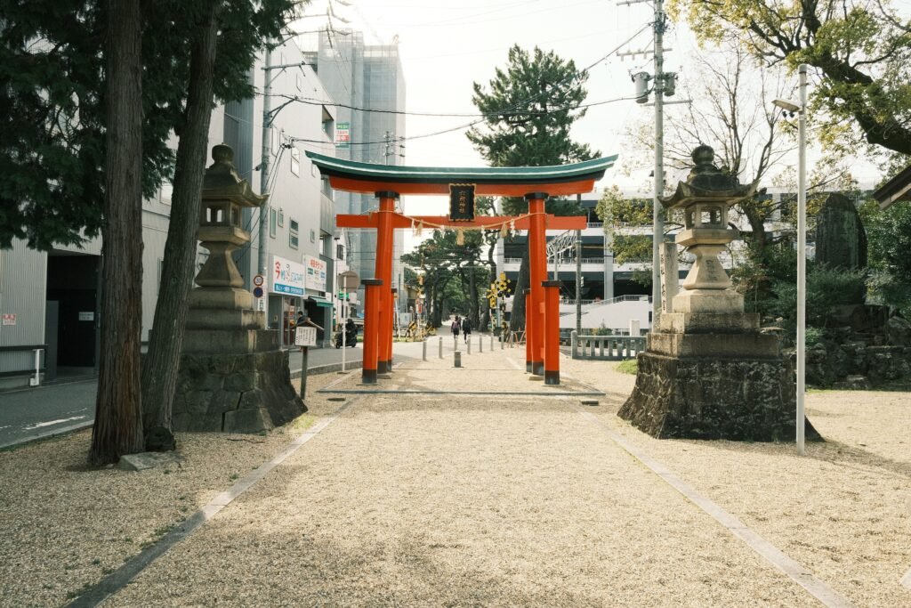 The giant vermillion torii gate marking the approach to Heian Jingu in Okazaki