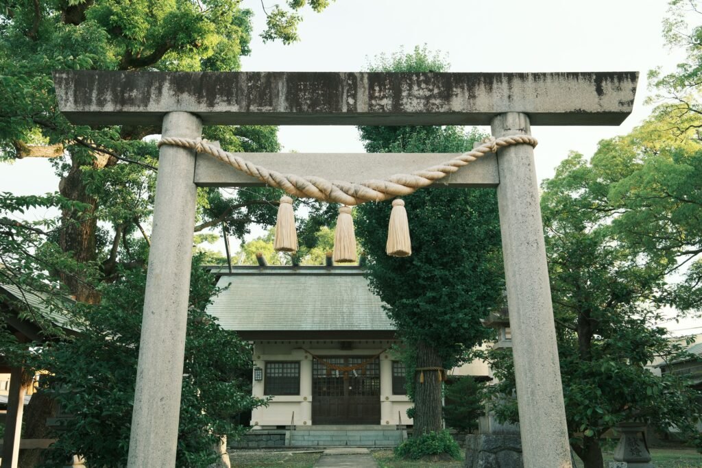 A Shinto shrine entrance with a torii gate, free to visit