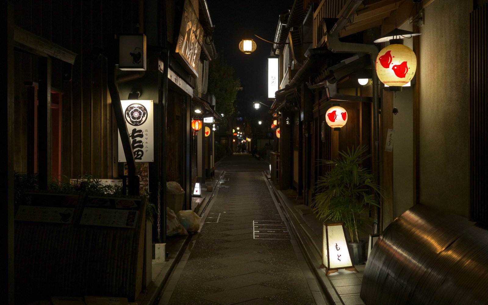 A lantern-lit alley in Kyoto's Pontocho district at night