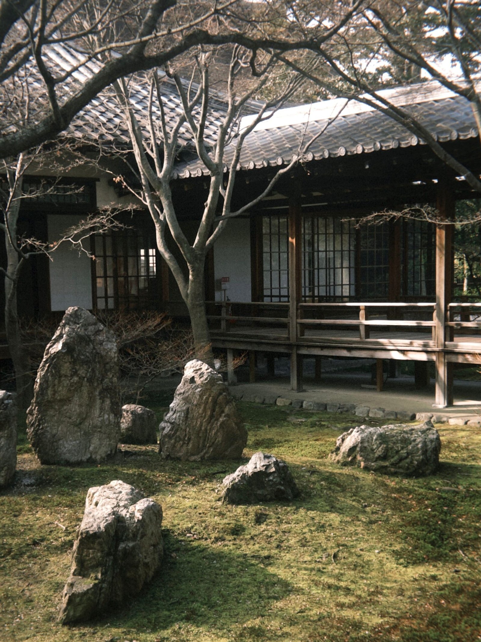 A traditional Japanese zen garden in Kyoto with raked gravel patterns