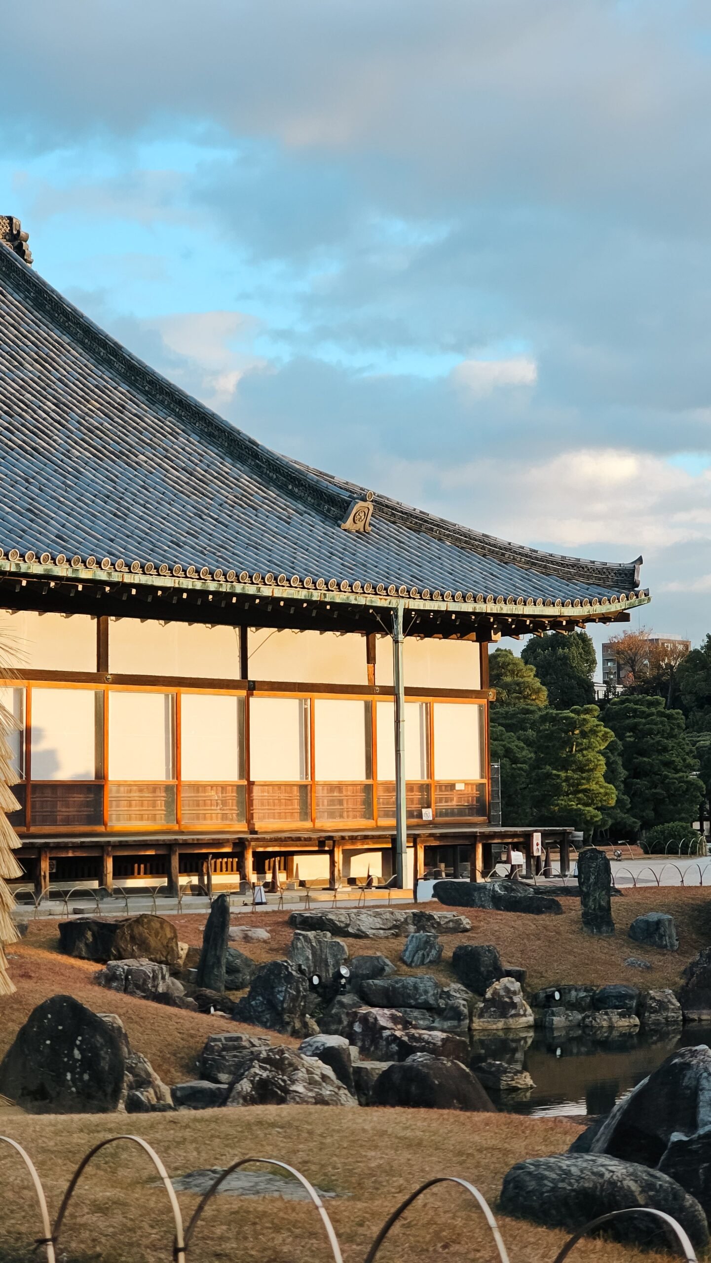 Traditional Japanese temple architecture in Kyoto with wooden eaves