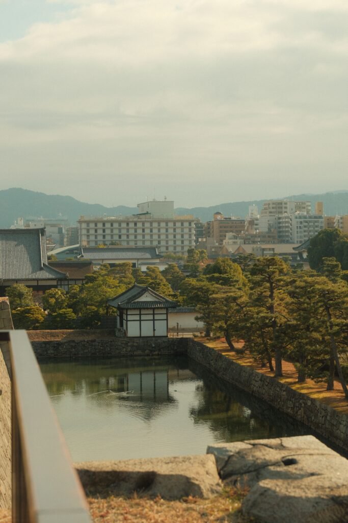 Traditional architecture and greenery within Nijo Castle grounds, Kyoto