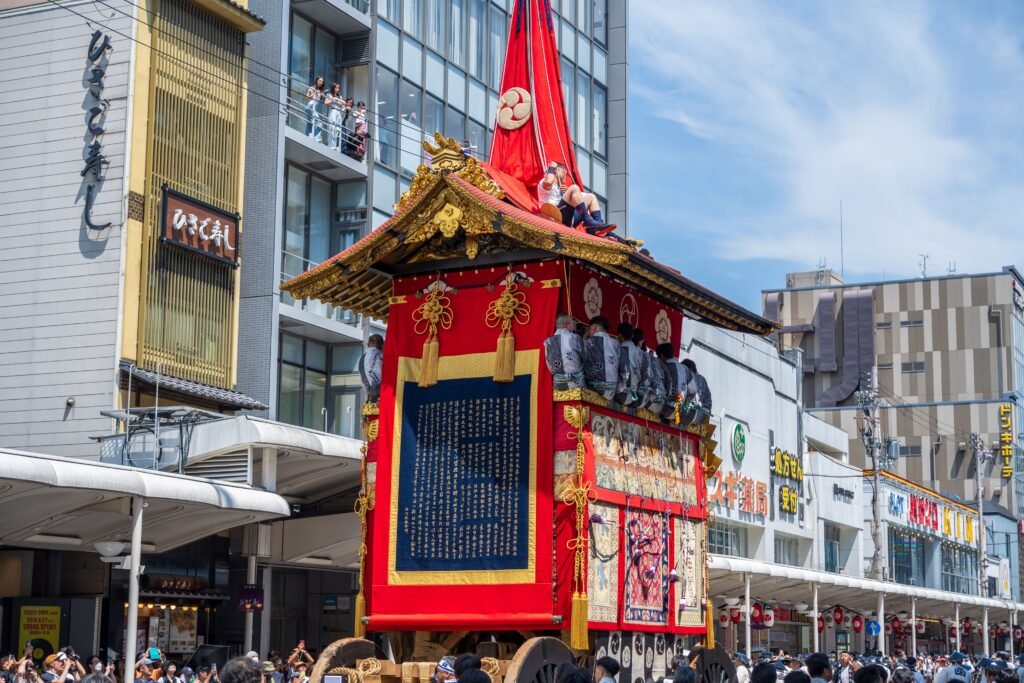 A traditional float parading through the streets during Gion Matsuri in Kyoto