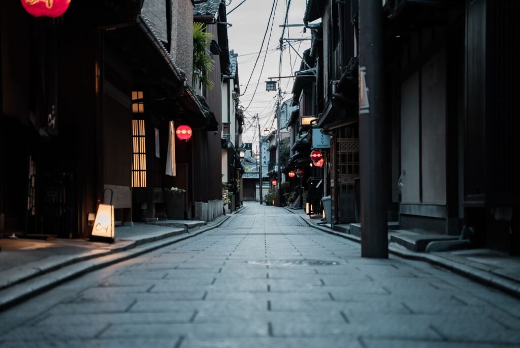 A red-lantern-lit alley in Kyoto's Pontocho and Gion district
