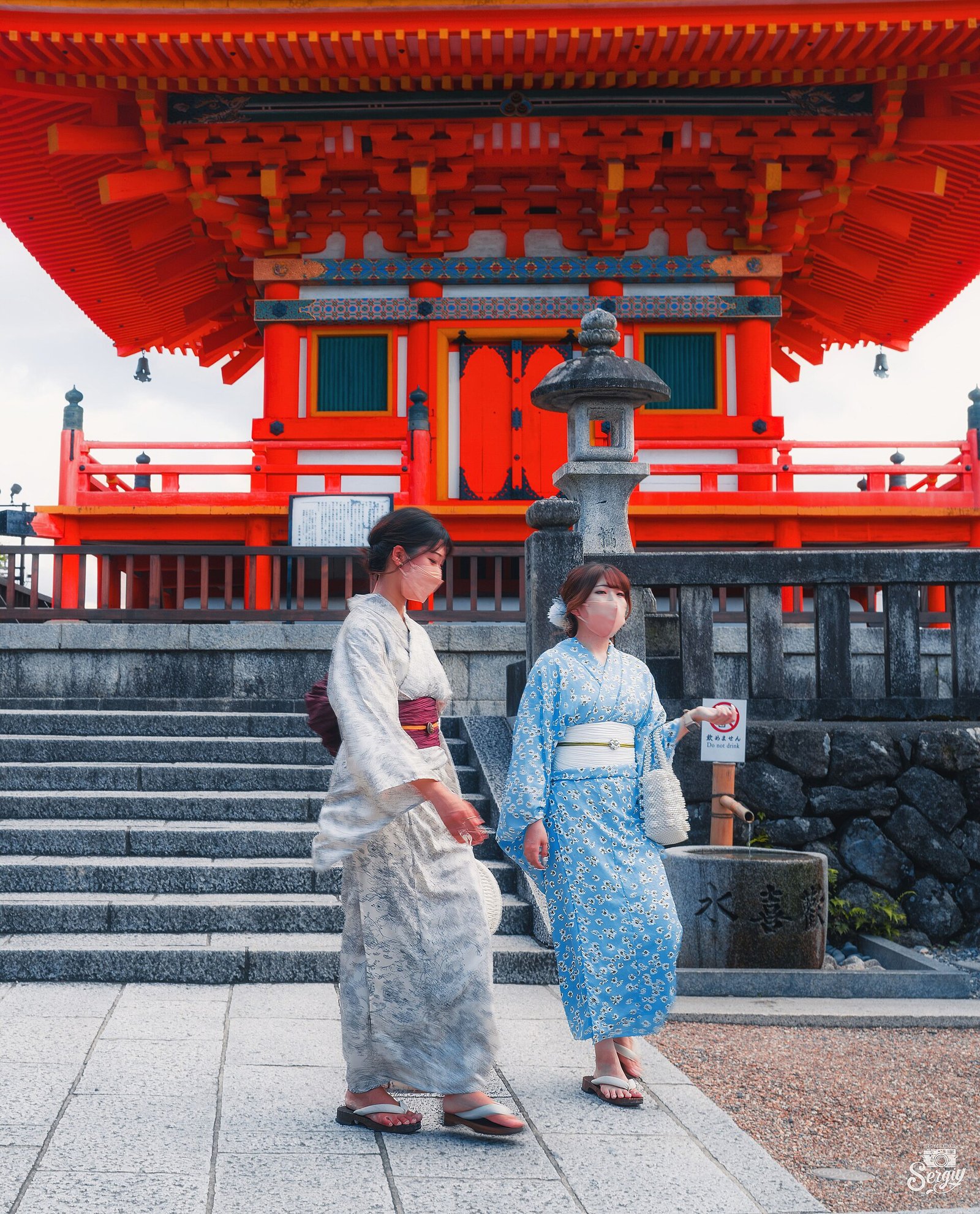 Visitors in rented kimono near the pagoda at Kiyomizu-dera