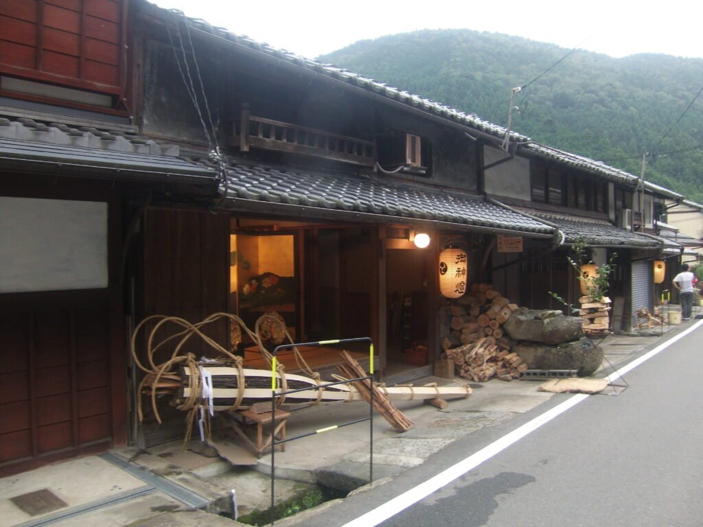 Torches lit for the Kurama Fire Festival at night near Kyoto
